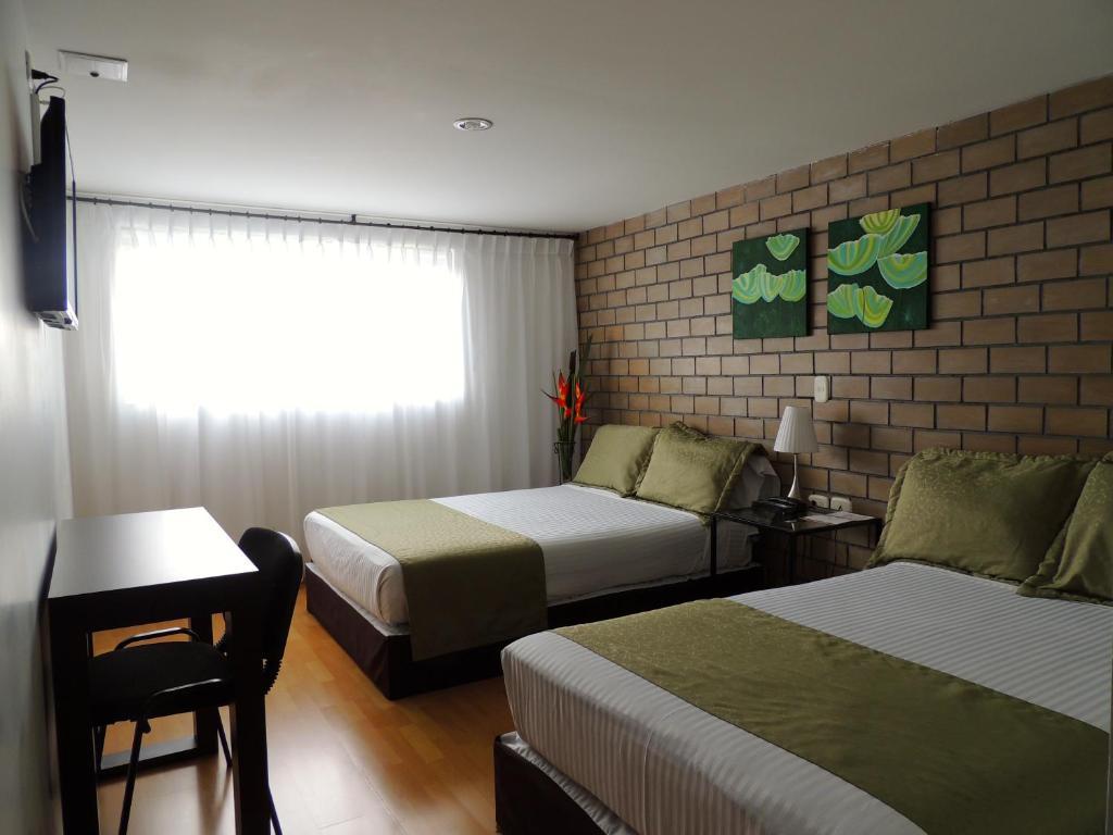 Hotel Portal De Milan Манісалес Номер фото